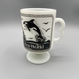 Vintage 1980 Sea World Pedestal Mug Milk Glass Black  White Footed Shamu Dolphin